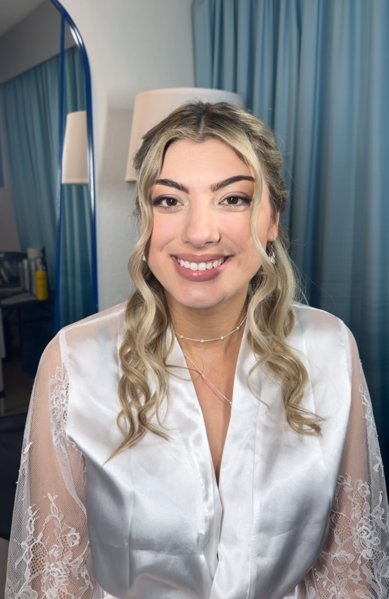 Soft glam bridal makeup and loose curls for Florida bride by Glow & Go Beauty